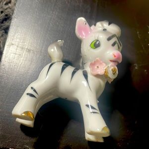 Garden spire zebra with flowers attached